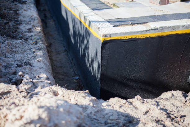 Professional Waterproofing technician working in Greenville, IN